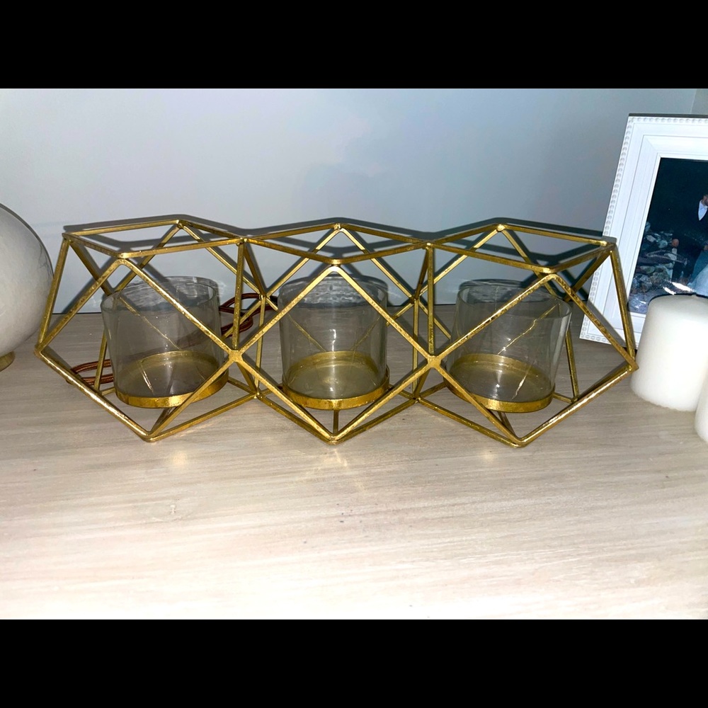 Gold candle centerpiece fits three pillar candles